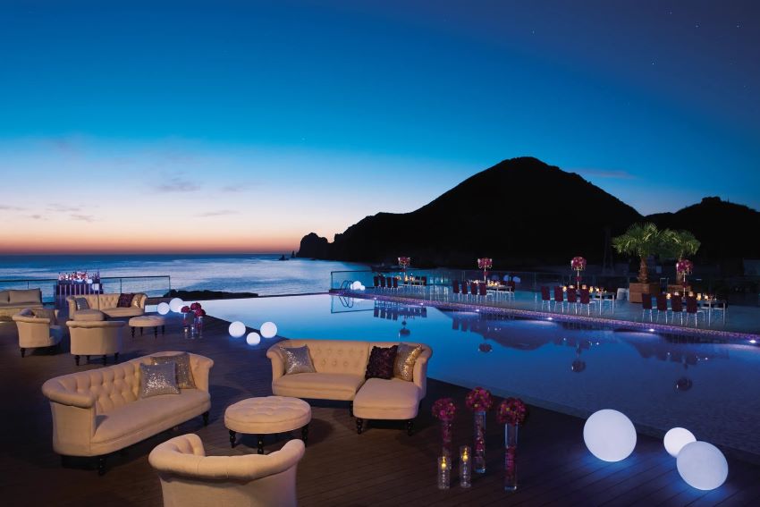 dinner setup at infinity pool at breathless cabo san lucas