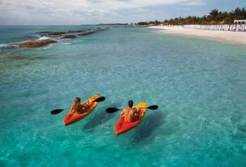 man and woman kayaking at el dorado royale