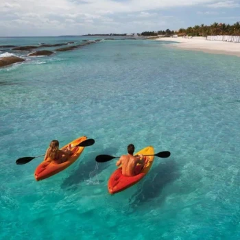 man and woman kayaking at el dorado royale