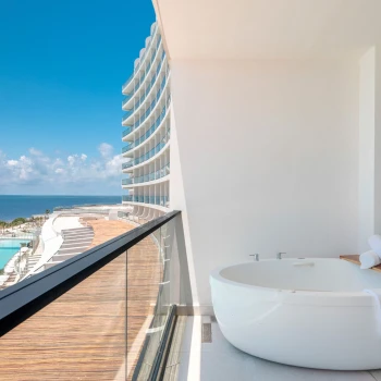 balcony with hot tub of suite at ava cancun