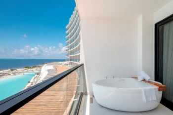balcony with hot tub of suite at ava cancun