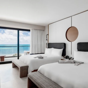 suite with two beds at ava resort cancun