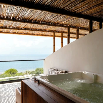 view from oceanfront suite with hot tub at AVA Resort Cancun