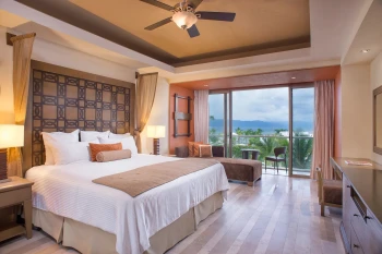 junior suite with king bed at Dreams Vallarta Bay