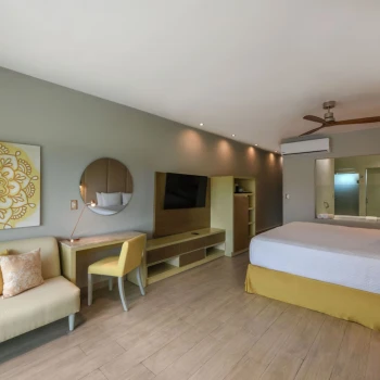 suite with king bed at El Dorado Royale