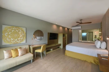 suite with king bed at El Dorado Royale