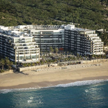 aerial view of Garza Blanca Resort & Spa Los Cabos with its beach and buildings
