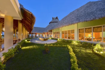 garden and restaurant at Iberostar Selection Playa Mita