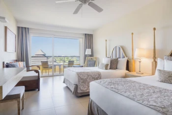 room with two beds at Iberostar Selection Playa Mita