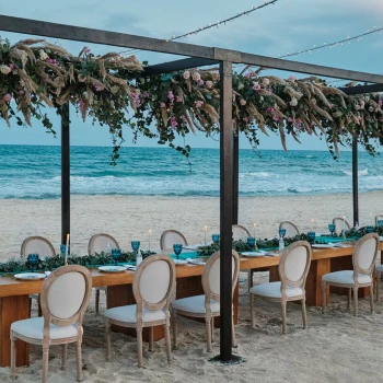 team dinner setup on the beach at Iberostar Selection Playa Mita