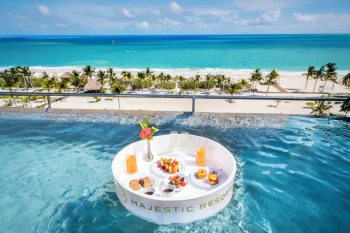 floating breakfast in the pool at Majestic Elegance Costa Mujeres