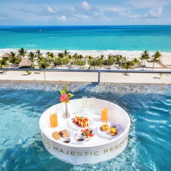 floating breakfast in the pool at Majestic Elegance Costa Mujeres