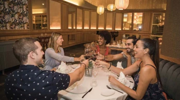 group of colleagues enjoying a meal at Majestic Elegance Costa Mujeres