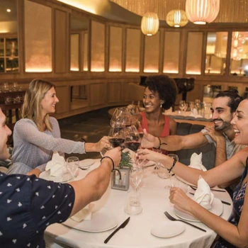 group of colleagues enjoying a meal at Majestic Elegance Costa Mujeres