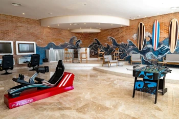 sports room with games at Majestic Elegance Costa Mujeres