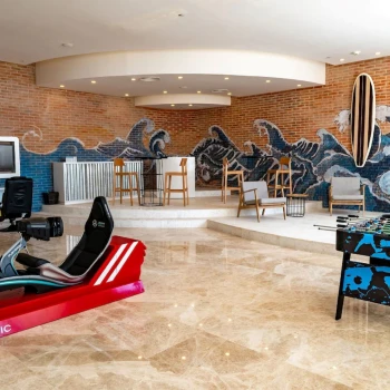 sports room with games at Majestic Elegance Costa Mujeres