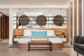 suite with king bed at Majestic Elegance Costa Mujeres