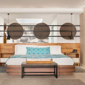 suite with king bed at Majestic Elegance Costa Mujeres