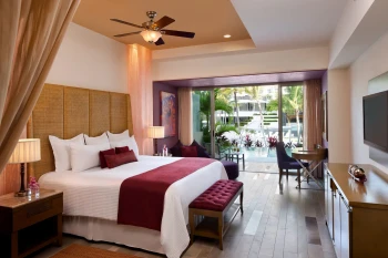 preferred club junior suite garden view swim out at Secrets Vallarta Bay with rustic decor and furnishings