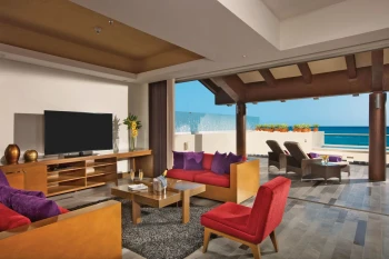living room and ocean view terrace of presidential suite at Secrets Vallarta Bay