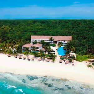 aerial view of The Beachfront by The Fives Hotels resort with it's private beach and pools