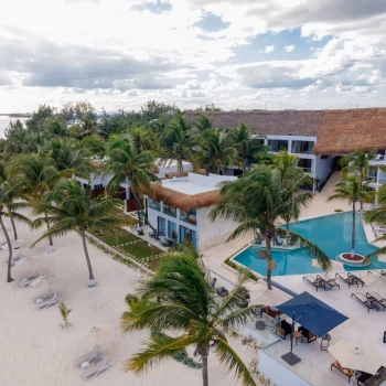 aerial view of The Beachfront by The Fives with its pools and accommodations and beach