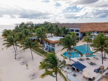 aerial view of The Beachfront by The Fives with its pools and accommodations and beach