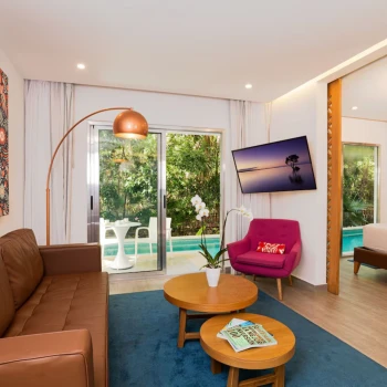 living room of one bedroom suite at The Fives Beach Hotel and Residences