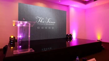 podium at the ballroom at The Fives Beach Hotel and Residences